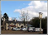 View of the White Lion from the crossroads of B471 and B4526